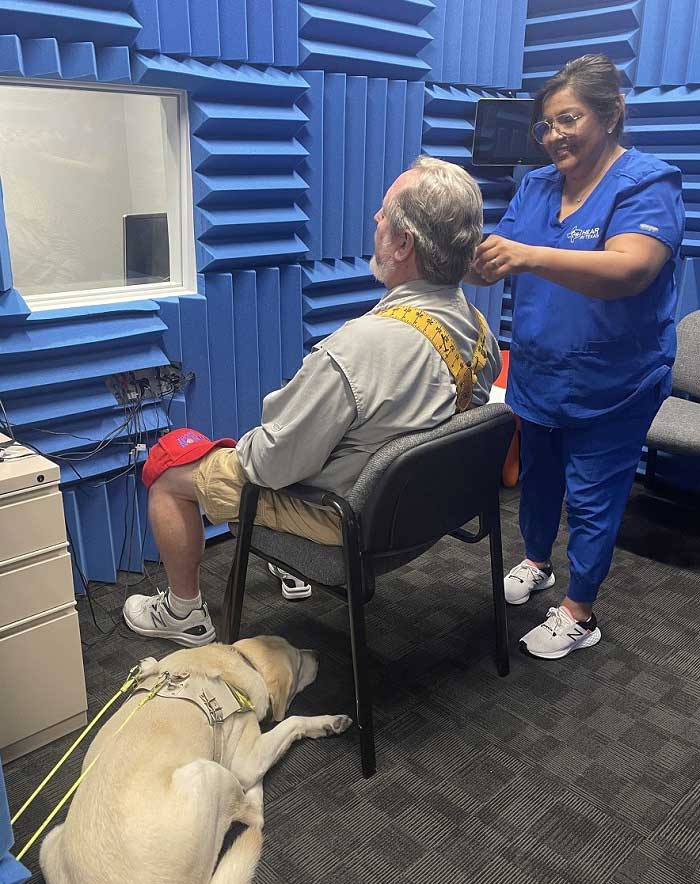 A Patient Undergoing a Physical Hearing Assessment at Hear in Texas