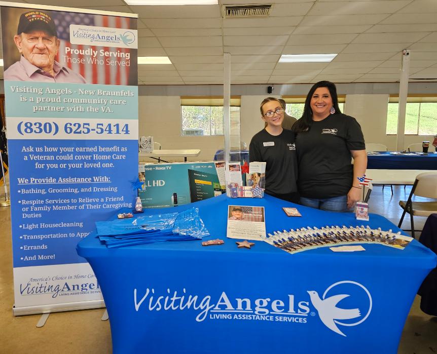 Visiting Angels Desk at Community Event Attended By Hear in Texas