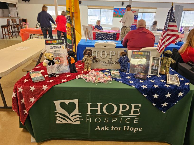 A Desk For Hope Hospice at Community Event Attended By Hear in Texas