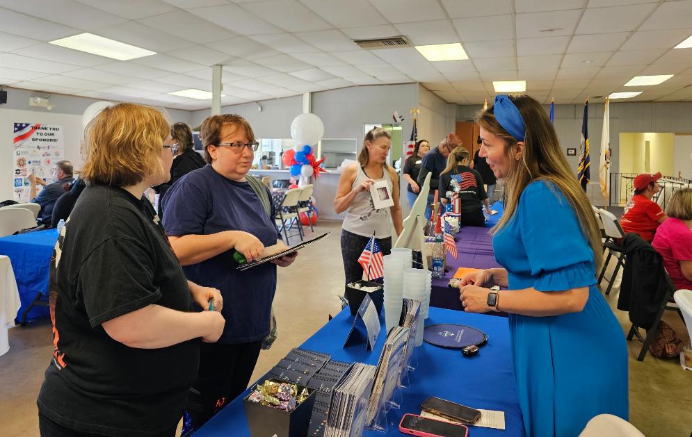 Desk At Local Community Event Attended By Hear in Texas