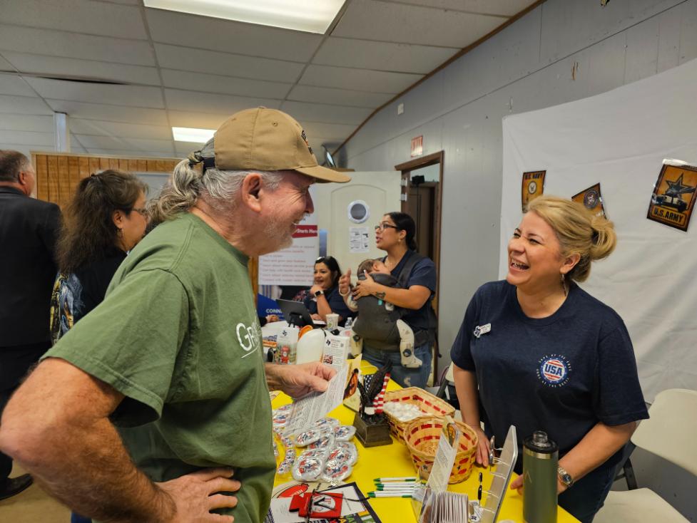 Desk At Local Community Event Attended By Hear in Texas